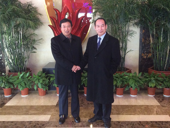 秦金玮同江苏鹏飞集团董事长,总经理王家安会谈